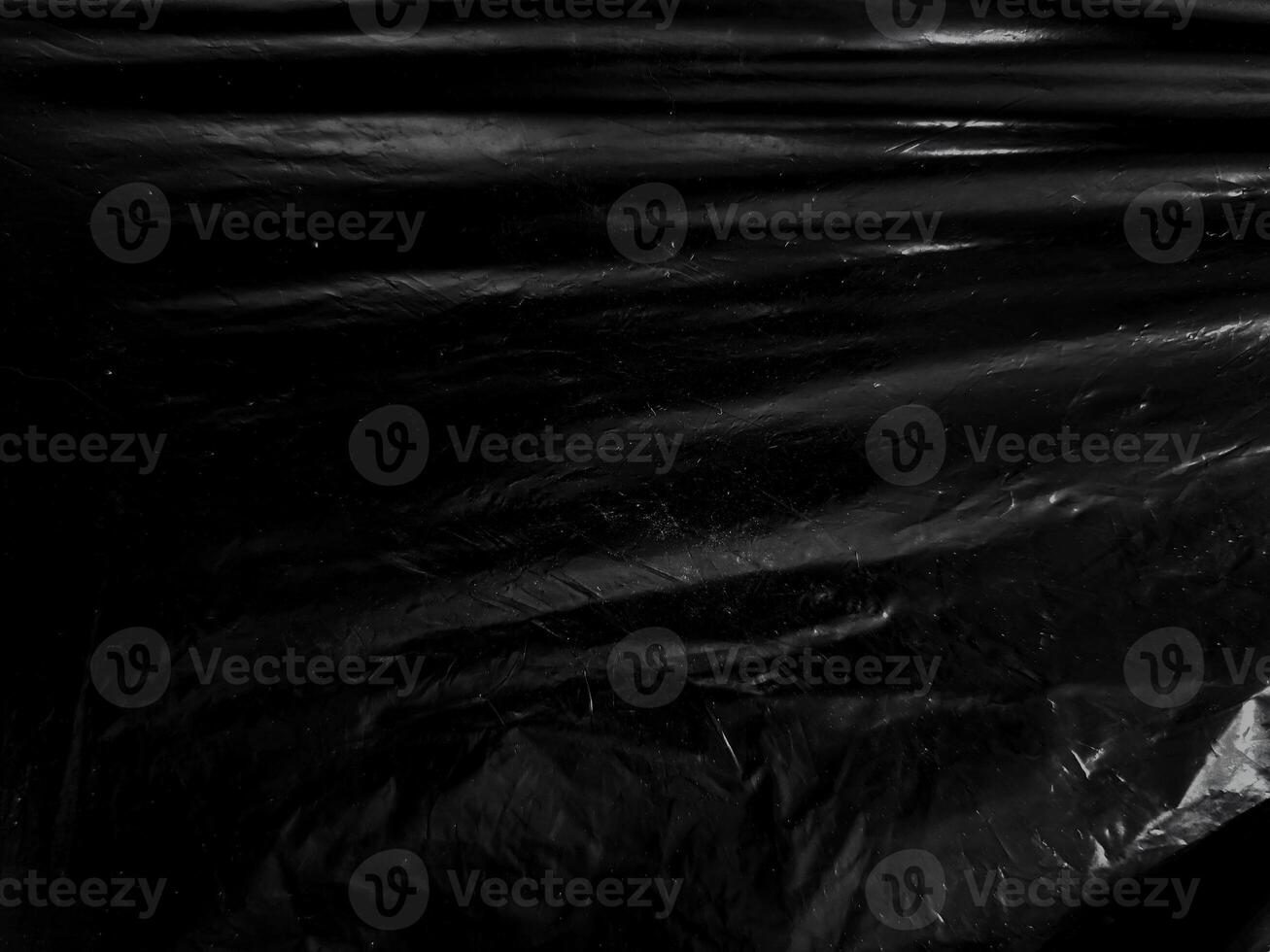 Black transparent plastic wrap texture overlay background. Realistic plastic for poster design and photo overlay effect. Wrinkled plastic surface pattern for graphic design sources and element.