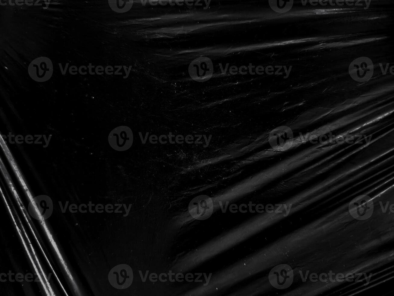 Black transparent plastic wrap texture overlay background. Realistic plastic for poster design and photo overlay effect. Wrinkled plastic surface pattern for graphic design sources and element.