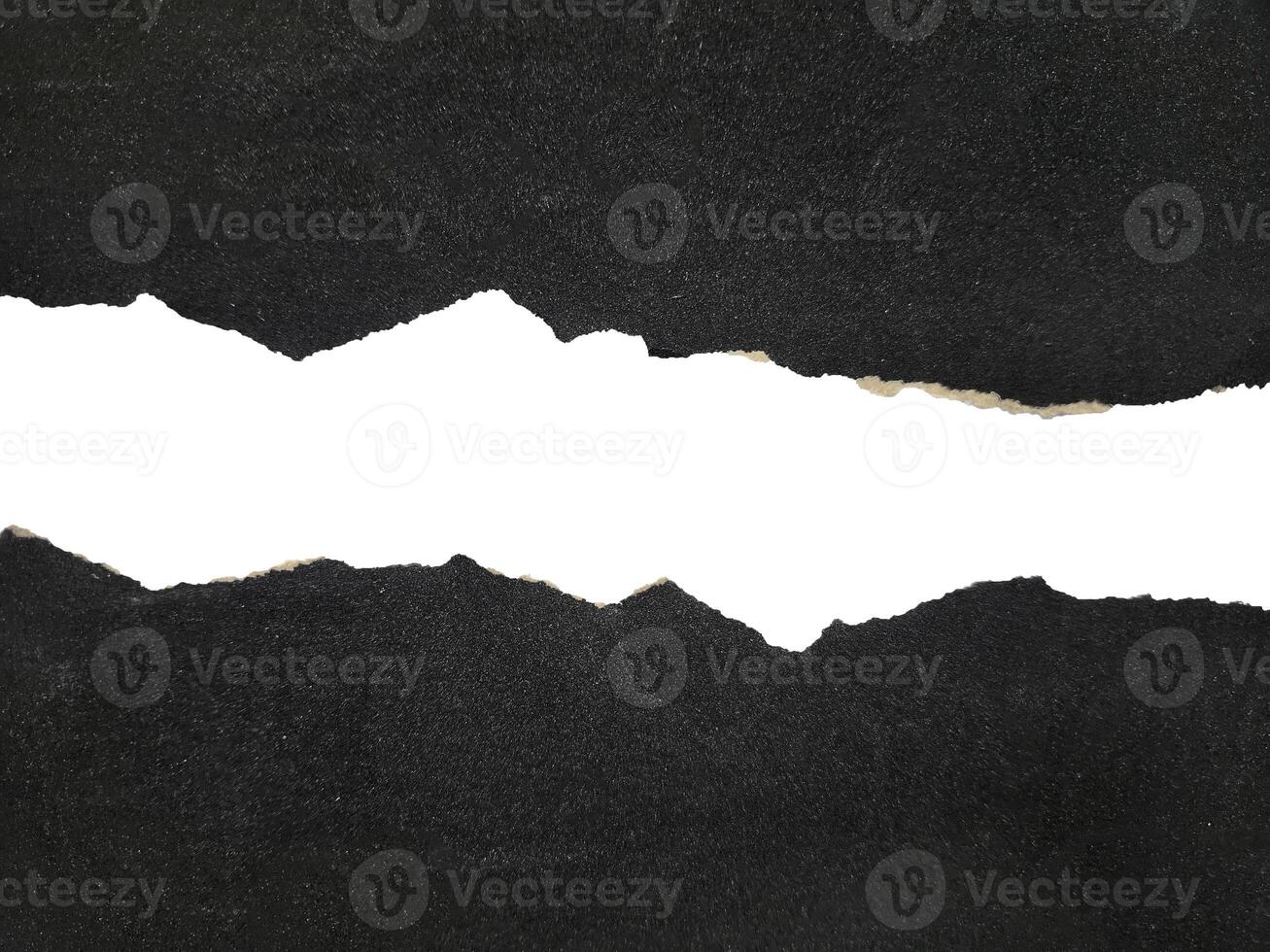 ripped black paper isolated, copy space. torn sandpaper texture overlay photo