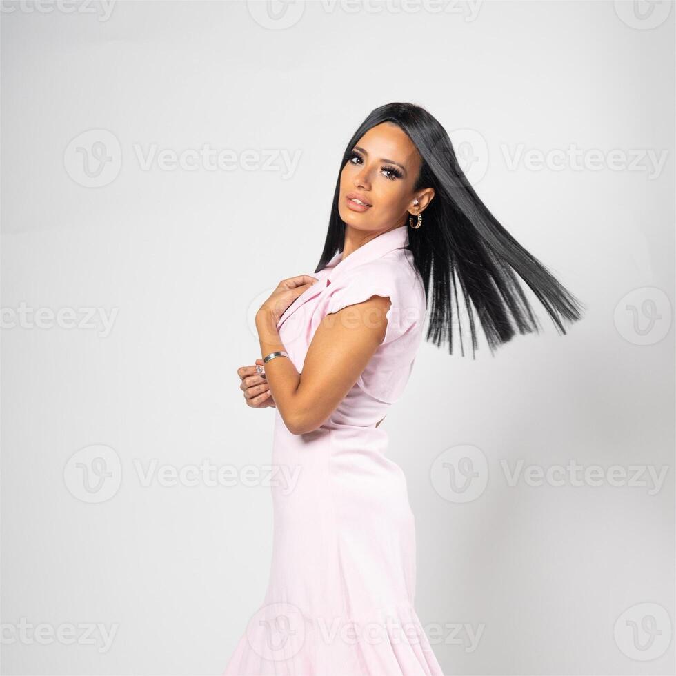 young woman, studio background, Charming brunette, Beautiful woman wearing white fabric, Beautiful and fashion brunette woman, a jug in a white dress on a gray, white background photo