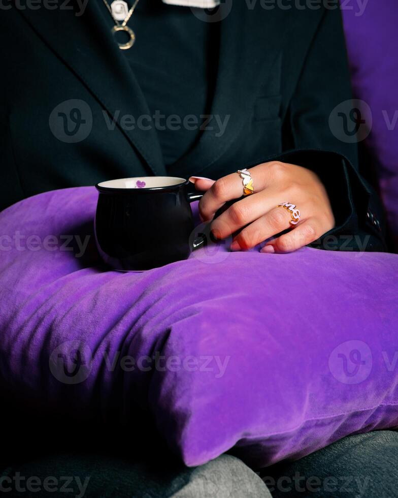 Young woman holding tea photo