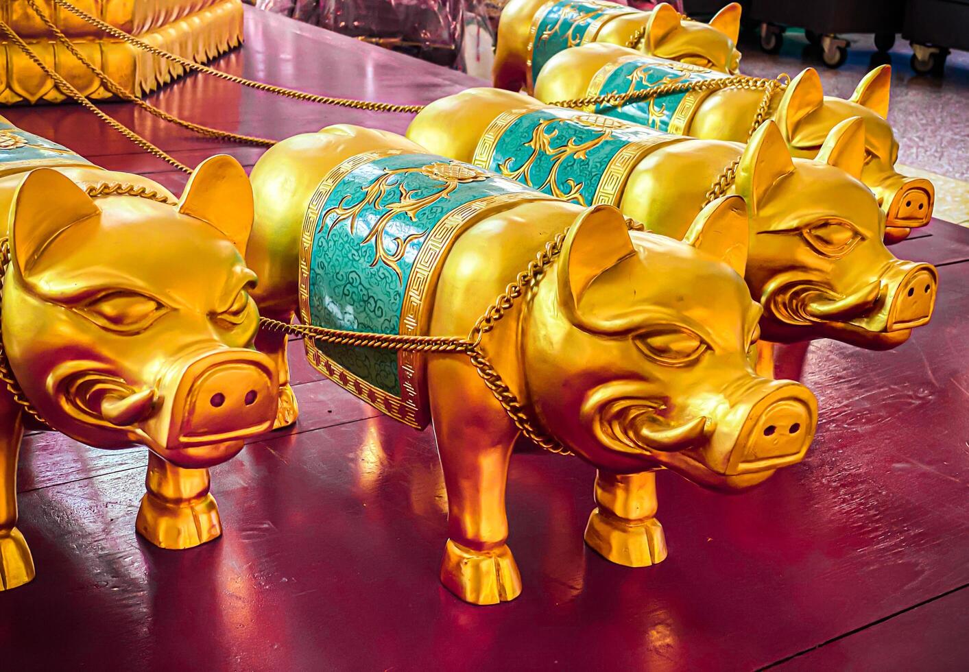 Golden pig statue is a beautiful Thai and Chinese architecture of Nachas sa thai chute shrine, naja shrine, najasaataichue, nezha shrine chinese temple. good luck Chinese New Year celebrations. photo