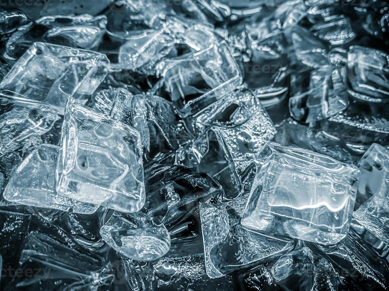 icecubes background,icecubes texture,icecubes wallpaper,ice helps to feel refreshed and cool water from the icecubes helps the water refresh your life and feel good.ice drinks for refreshment business photo