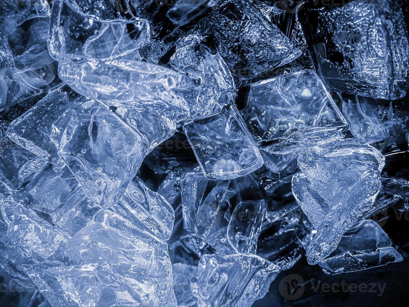icecubes background,icecubes texture,icecubes wallpaper,ice helps to feel refreshed and cool water from the icecubes helps the water refresh your life and feel good.ice drinks for refreshment business photo