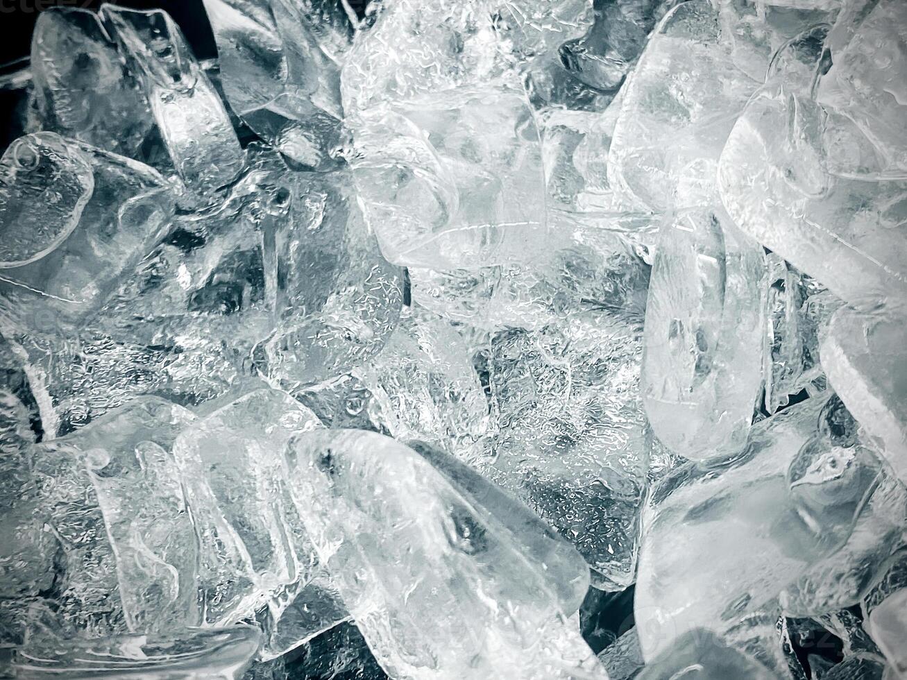 icecubes background,icecubes texture,icecubes wallpaper,ice helps to feel refreshed and cool water from the icecubes helps the water refresh your life and feel good.ice drinks for refreshment business photo
