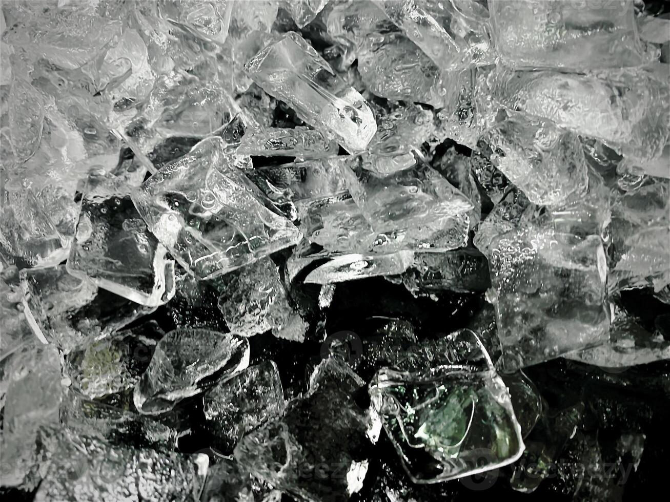 icecubes background,icecubes texture,icecubes wallpaper,ice helps to feel refreshed and cool water from the icecubes helps the water refresh your life and feel good.ice drinks for refreshment business photo