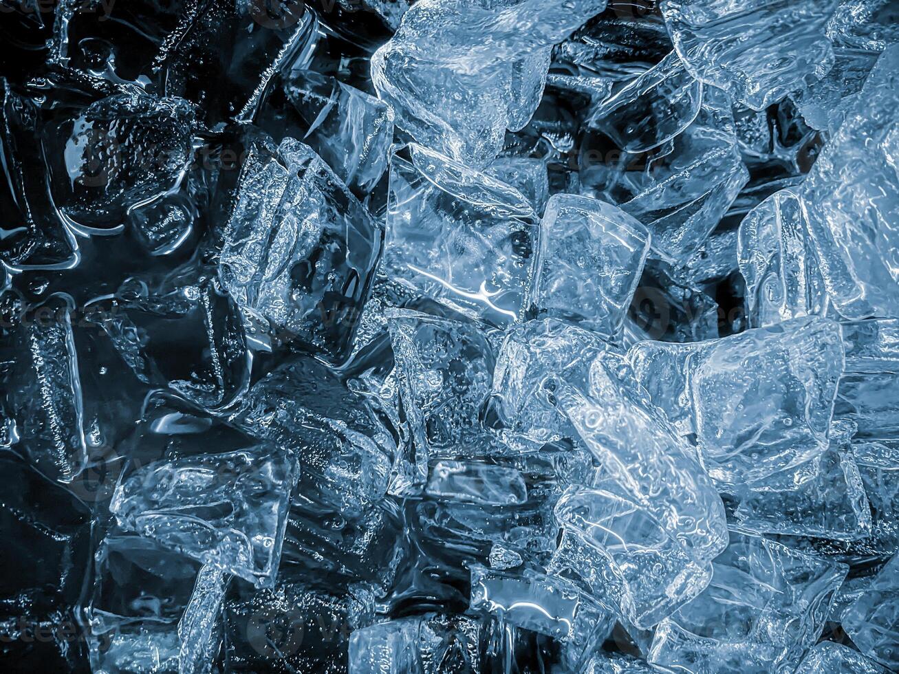 icecubes background,icecubes texture,icecubes wallpaper,ice helps to feel refreshed and cool water from the icecubes helps the water refresh your life and feel good.ice drinks for refreshment business photo