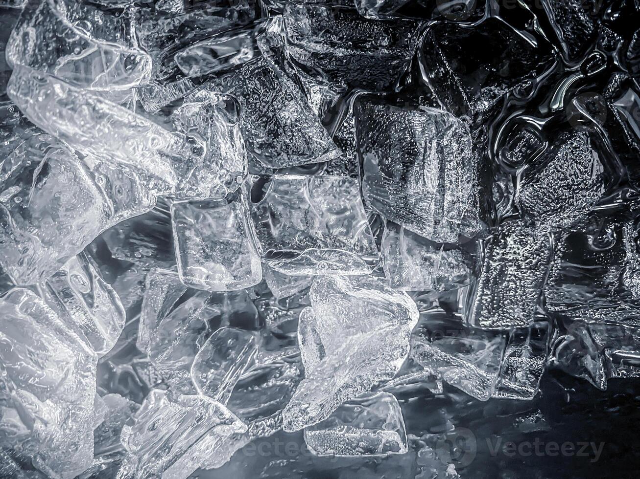 icecubes background,icecubes texture,icecubes wallpaper,ice helps to feel refreshed and cool water from the icecubes helps the water refresh your life and feel good.ice drinks for refreshment business photo