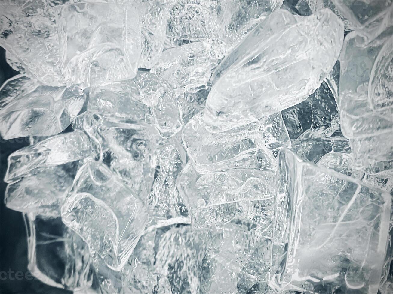 icecubes background,icecubes texture,icecubes wallpaper,ice helps to feel refreshed and cool water from the icecubes helps the water refresh your life and feel good.ice drinks for refreshment business photo