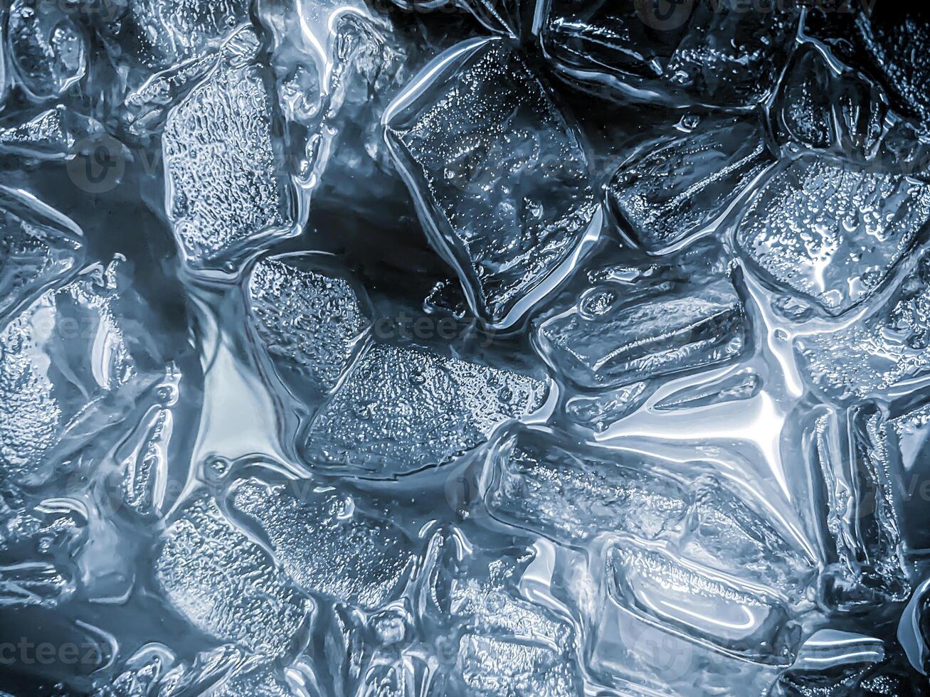 icecubes background,icecubes texture,icecubes wallpaper,ice helps to feel refreshed and cool water from the icecubes helps the water refresh your life and feel good.ice drinks for refreshment business photo