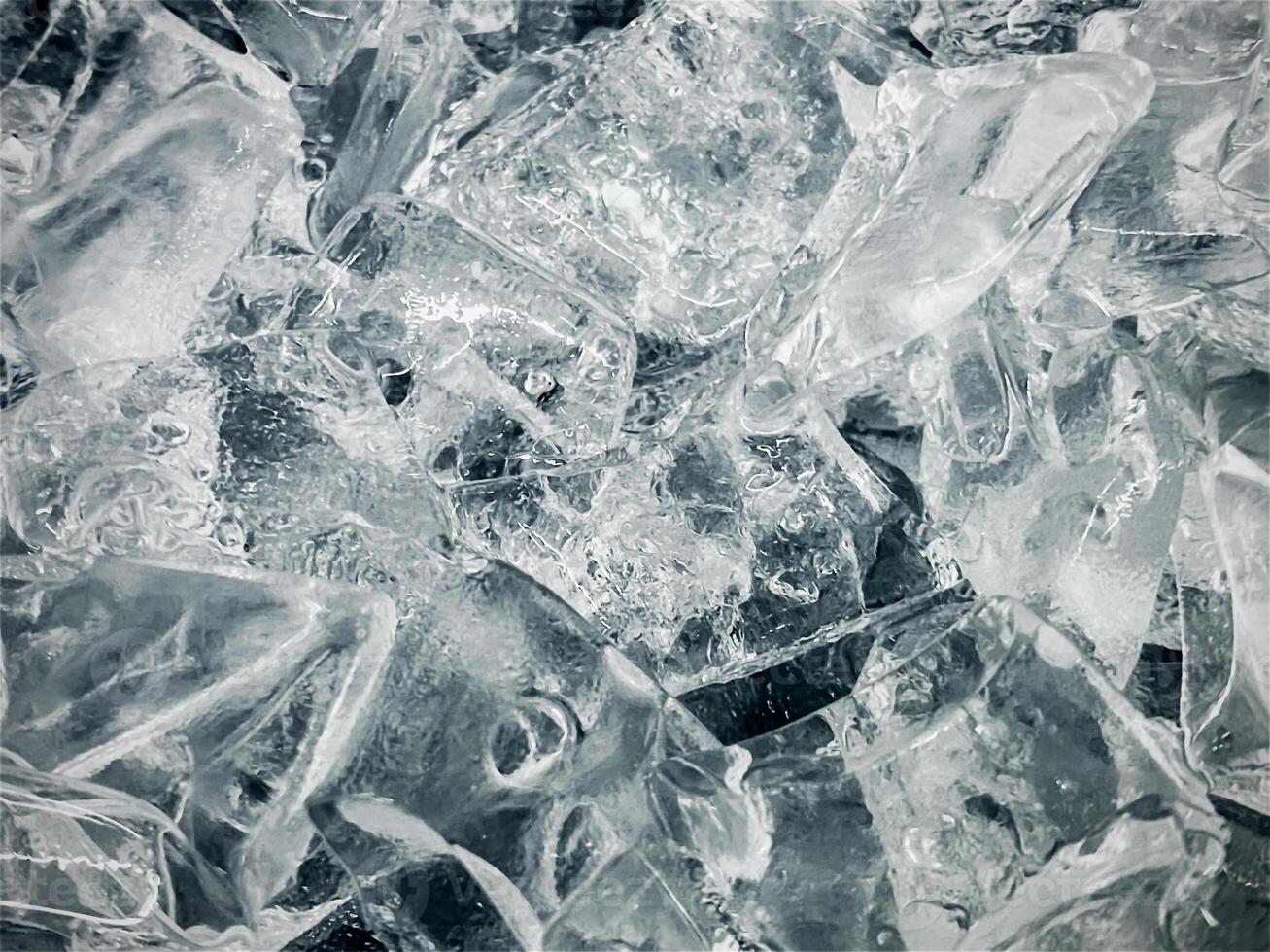 icecubes background,icecubes texture,icecubes wallpaper,ice helps to feel refreshed and cool water from the icecubes helps the water refresh your life and feel good.ice drinks for refreshment business photo