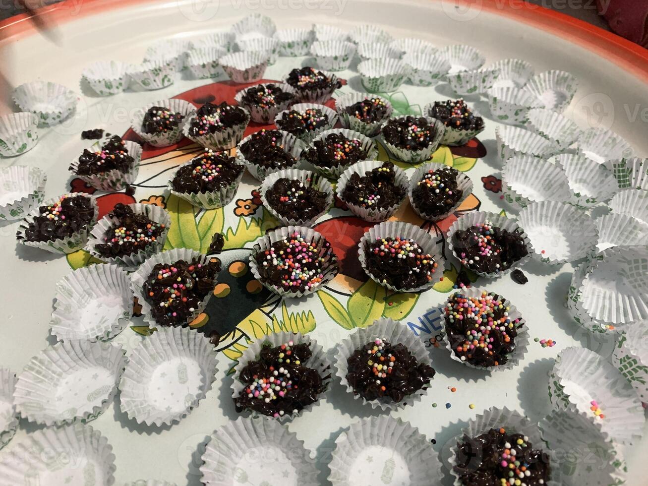 Chocolate peanut cake with cereal topping photo