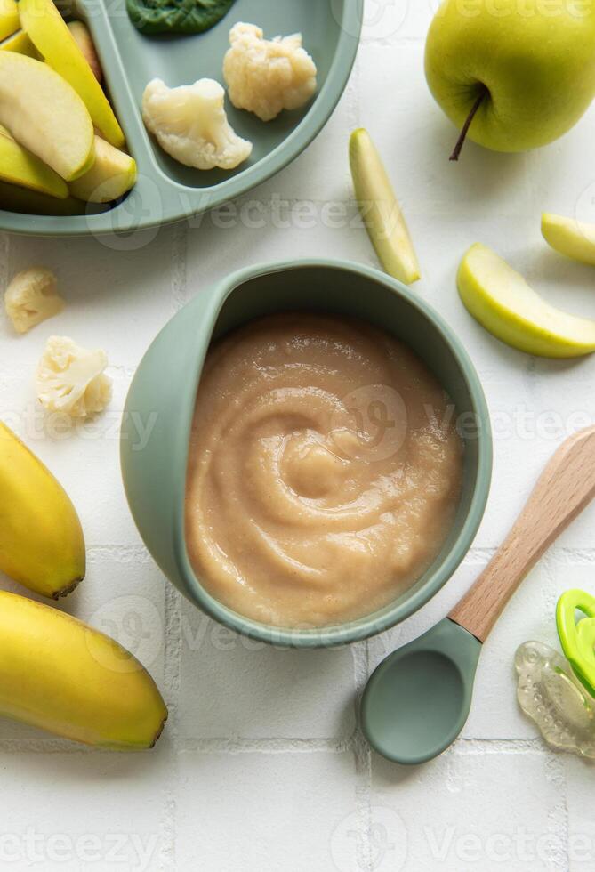 Healthy baby food in bowl. photo