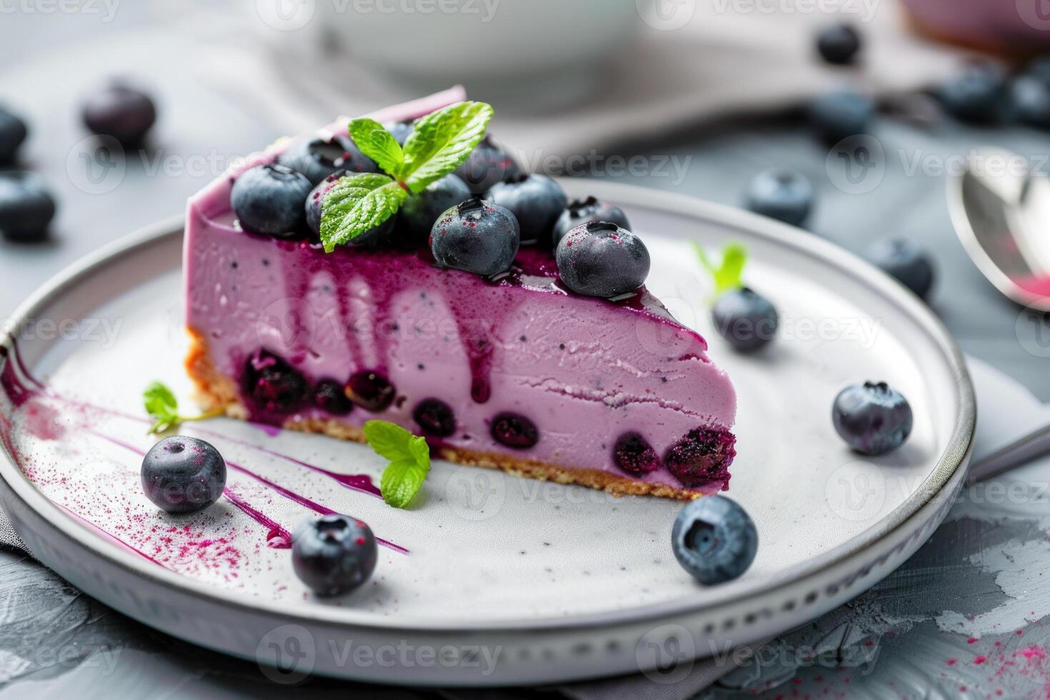 Slice of Blueberry Cheesecake With Fresh Berries on a White Plate, Elegantly Presented photo