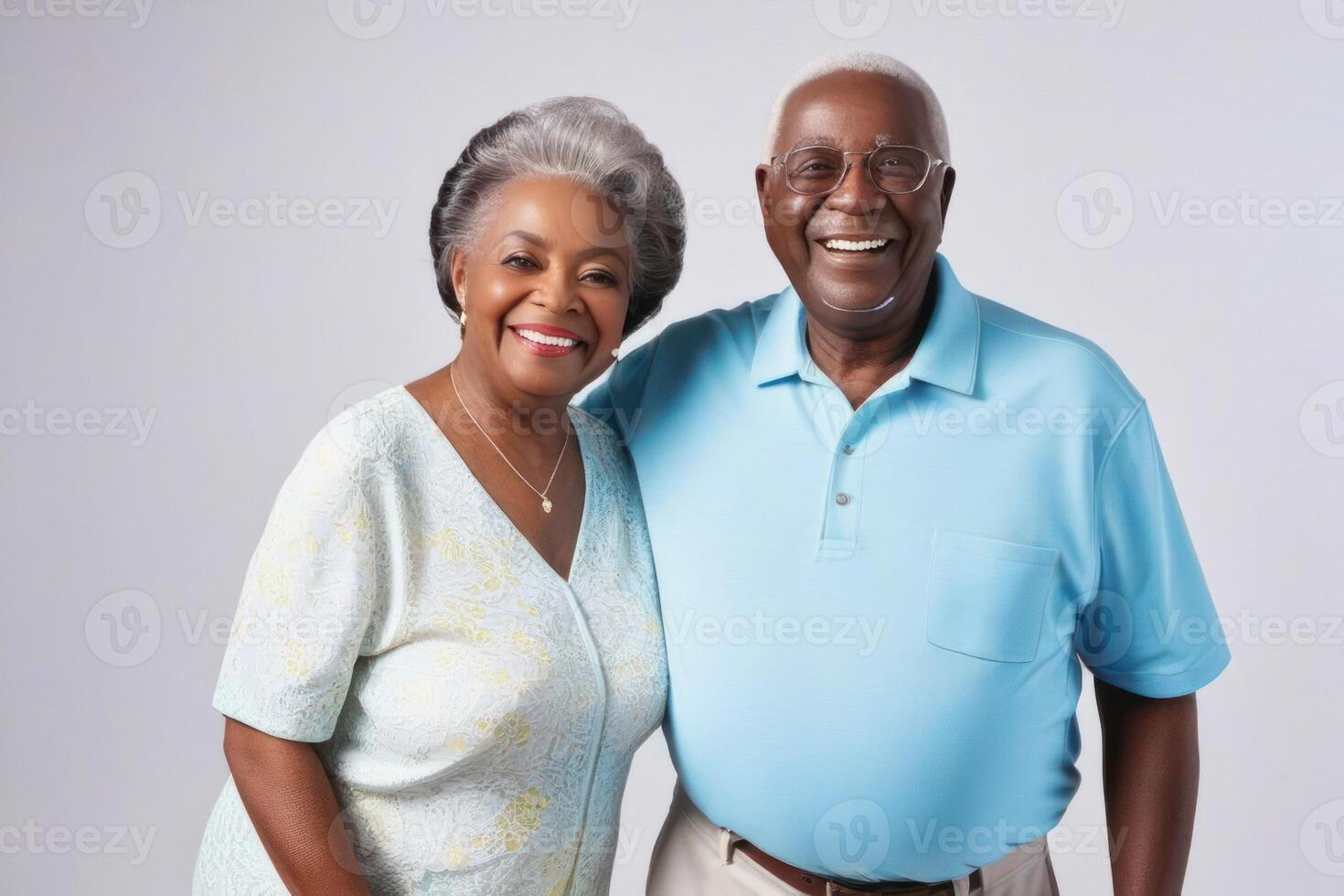 Happy black skin senior couple in light background. Concept of success in business and life. photo