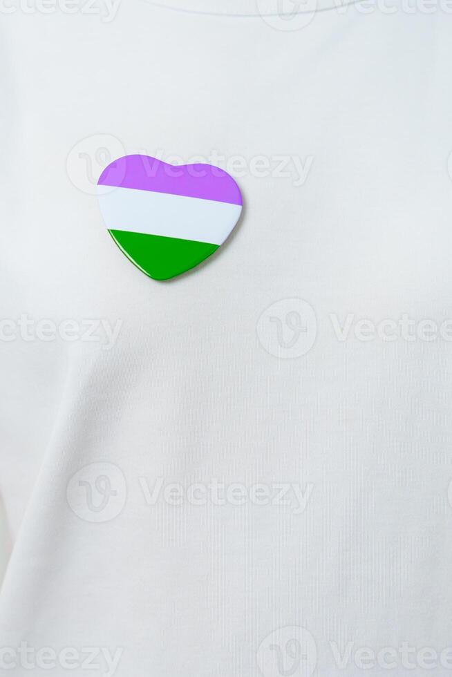 Queer Pride Day and LGBT pride month concept. purple, white and green heart shape for Lesbian, Gay, Bisexual, Transgender, genderqueer and Pansexual community photo