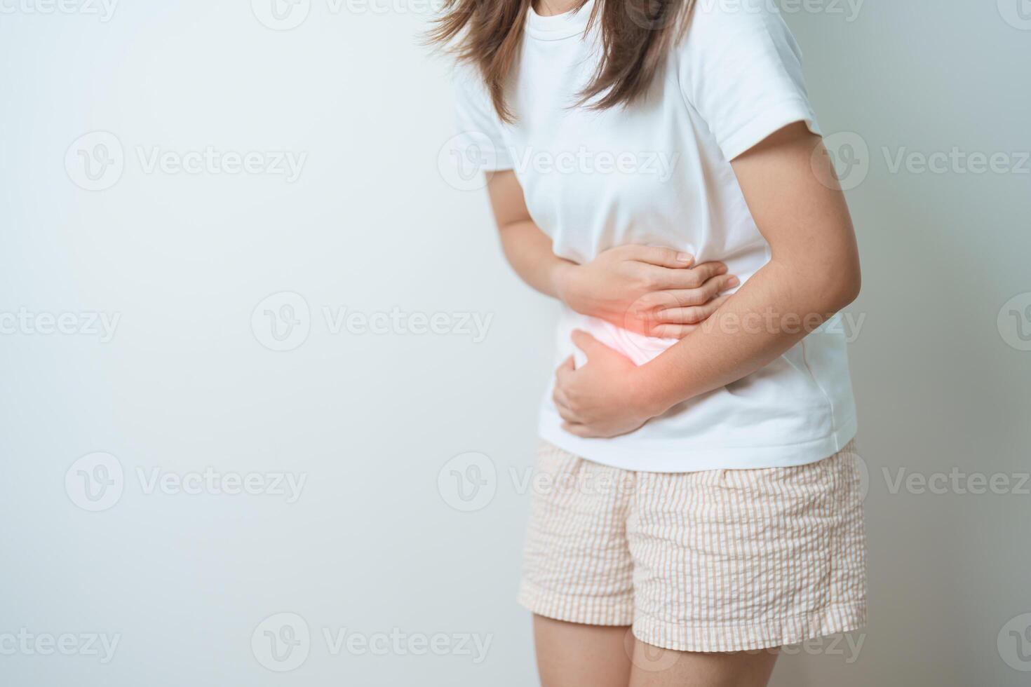 woman having abdomen ache due to Stomach pain, digestion with constipation or Diarrhea from food poisoning, female problem and Endometriosis, Hysterectomy and Menstrual photo