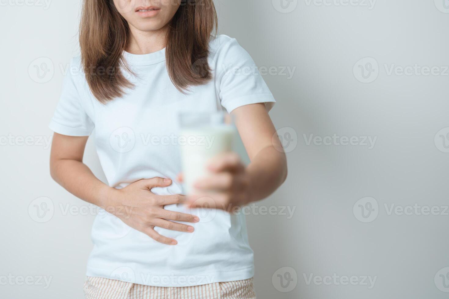 Lactose intolerance and Milk allergy concept. woman hold Milk glass and