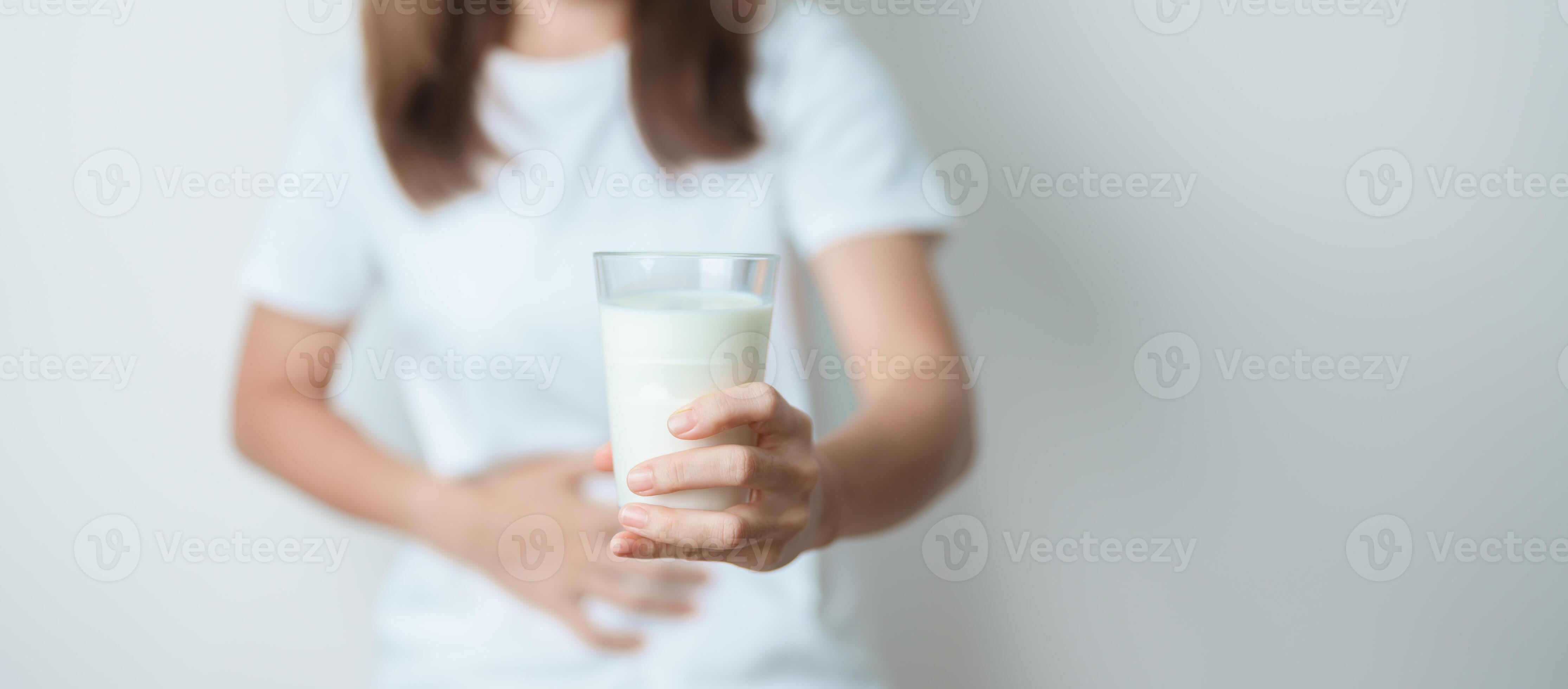 Lactose intolerance and Milk allergy concept. woman hold Milk glass and