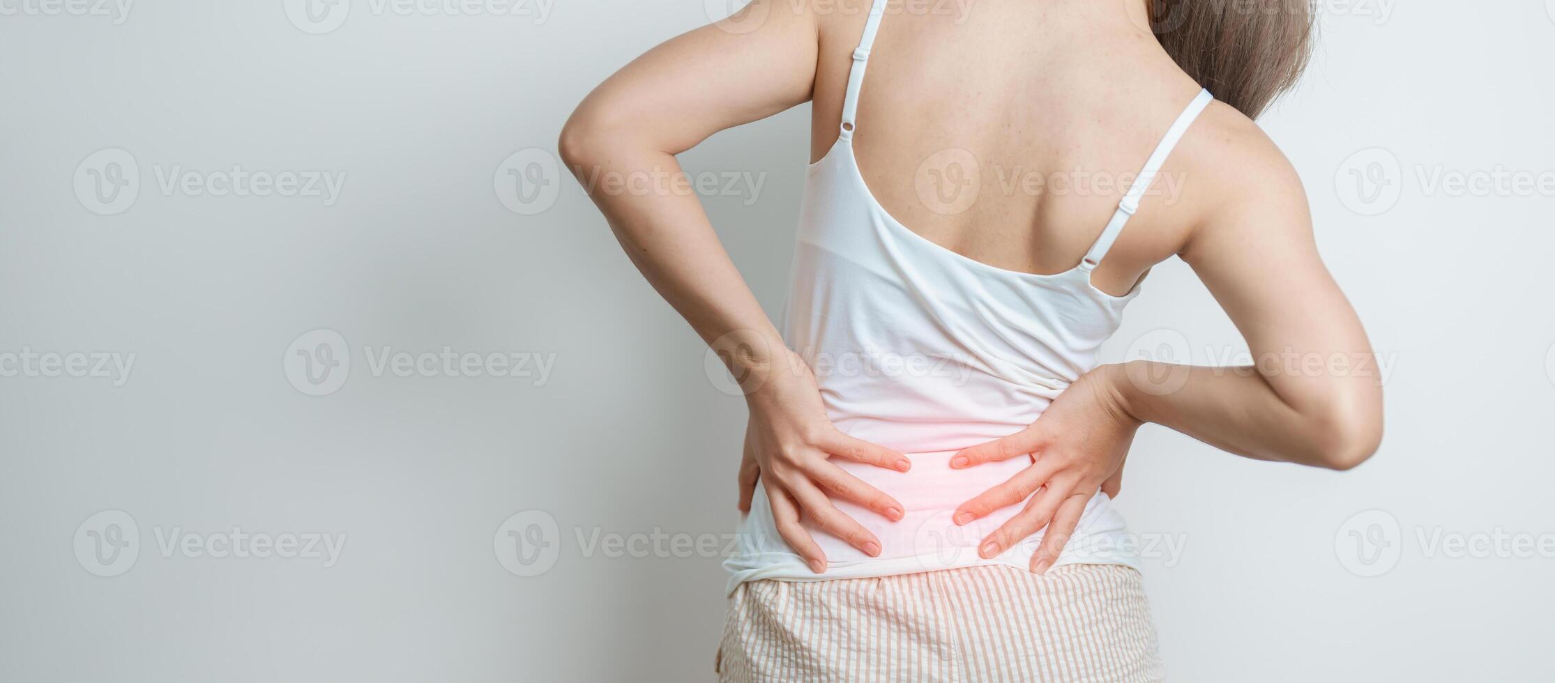 woman having back body ache during at home. adult female with muscle pain due to Piriformis Syndrome, Low Back Pain and Spinal Compression. Office syndrome and medical concept photo