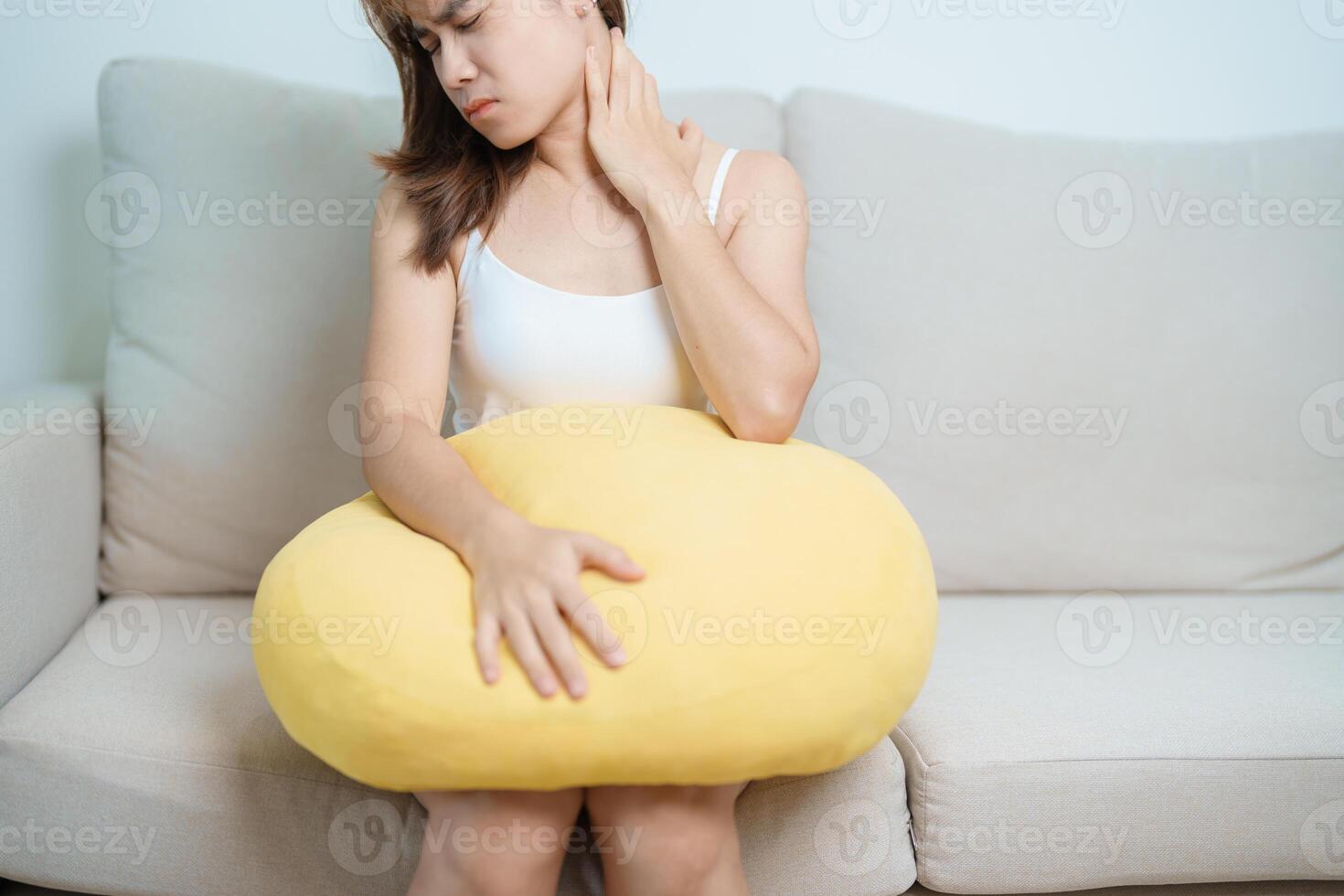 Woman having Neck and Shoulder pain at home. Muscle painful due to Myofascial pain syndrome and Fibromyalgia, rheumatism, Scapular pain, Cervical Spine. ergonomic concept photo