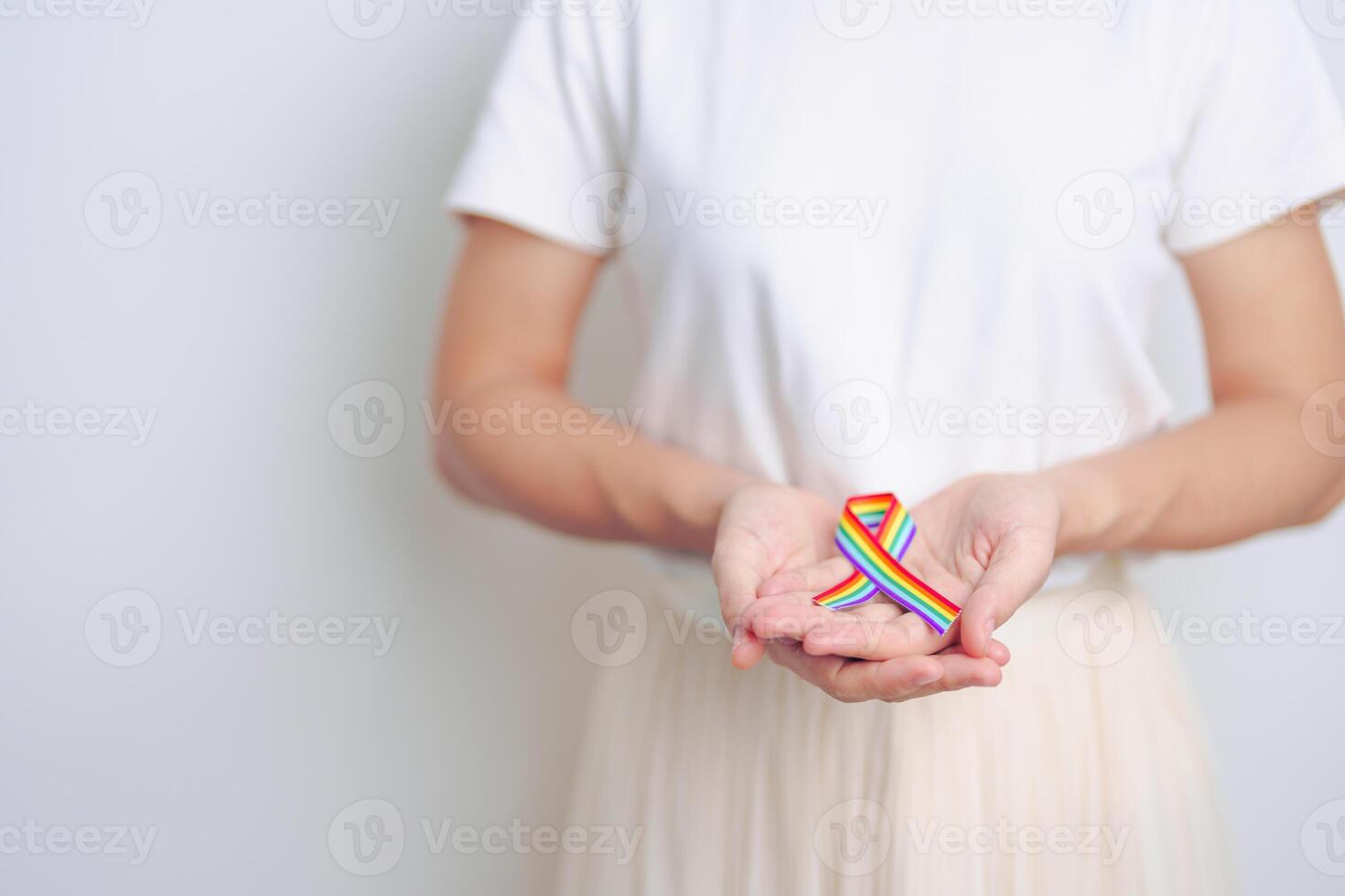 LGBT pride month concept or LGBTQ or LGBTQIA with rainbow ribbon for Lesbian, Gay, Bisexual, Transgender, Queer, Intersex, Asexual, Agender, Non Binary, Two Spirit, Pansexual and Demisexual photo