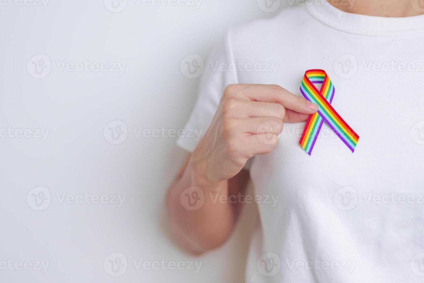 LGBT pride month concept or LGBTQ or LGBTQIA with rainbow ribbon for Lesbian, Gay, Bisexual, Transgender, Queer, Intersex, Asexual, Agender, Non Binary, Two Spirit, Pansexual and Demisexual photo