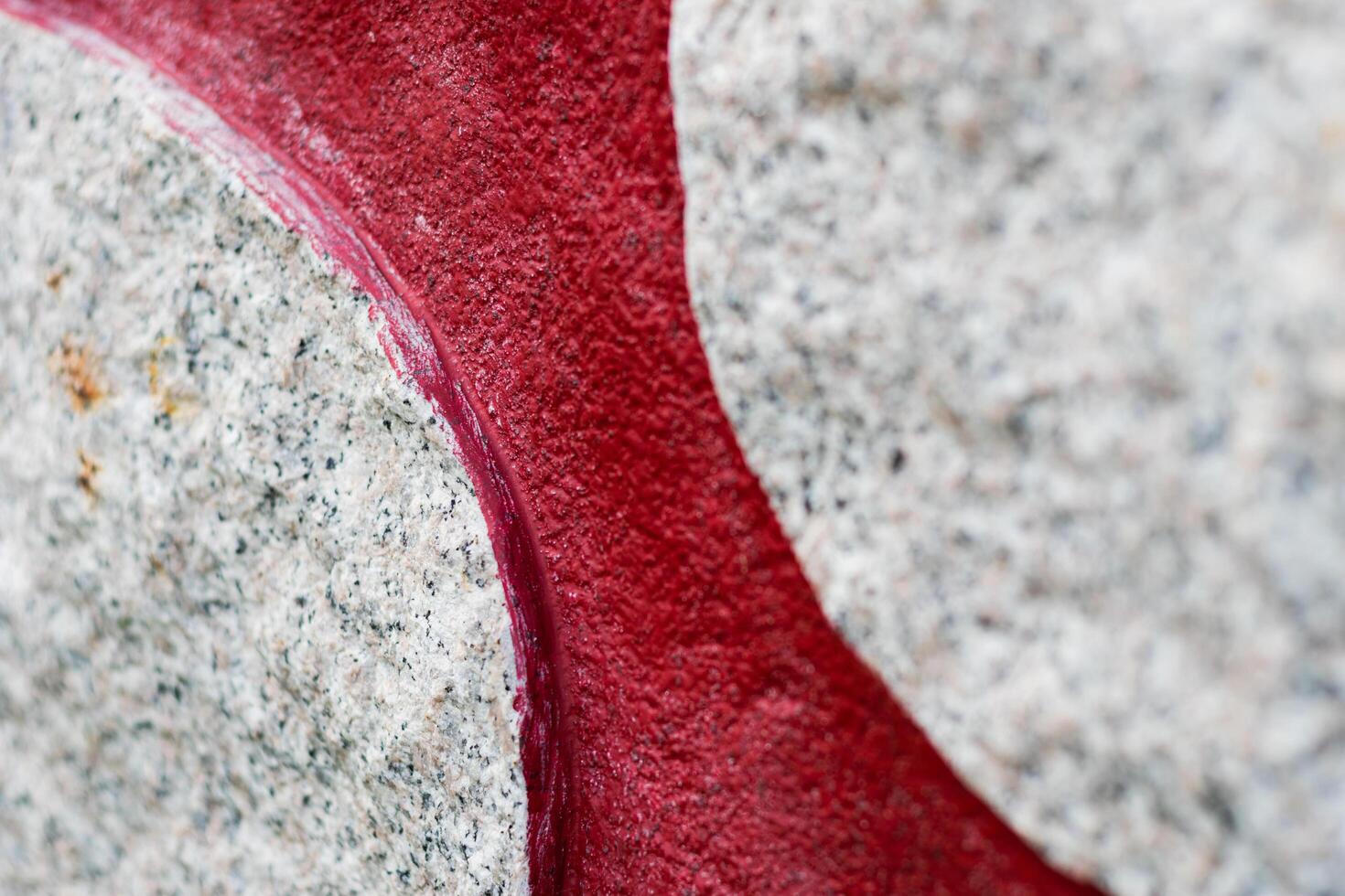 Cement wall background with contrast color. That is red and white. photo