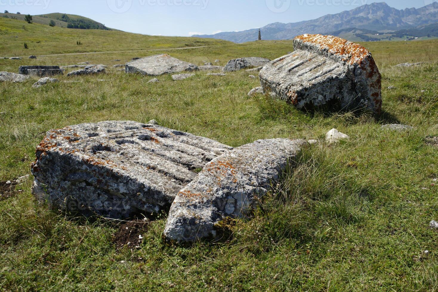 Stecci Medieval Tombstones Graveyards in Zabljak, Montenegro. Historic place of interest. The tombstones feature a wide range of decorative motifs and inscriptions. photo