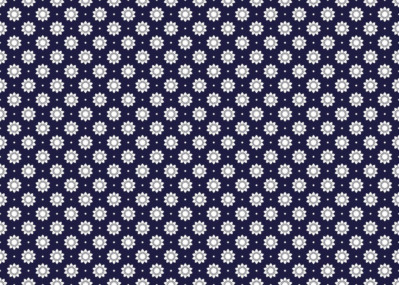 White symbol flowers form on dark blue background, ethnic fabric seamless pattern design for cloth, carpet, batik, wallpaper, wrapping etc. vector