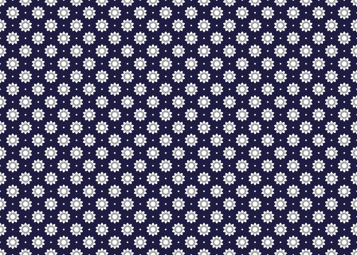 White symbol flowers form on dark blue background, ethnic fabric seamless pattern design for cloth, carpet, batik, wallpaper, wrapping etc. vector