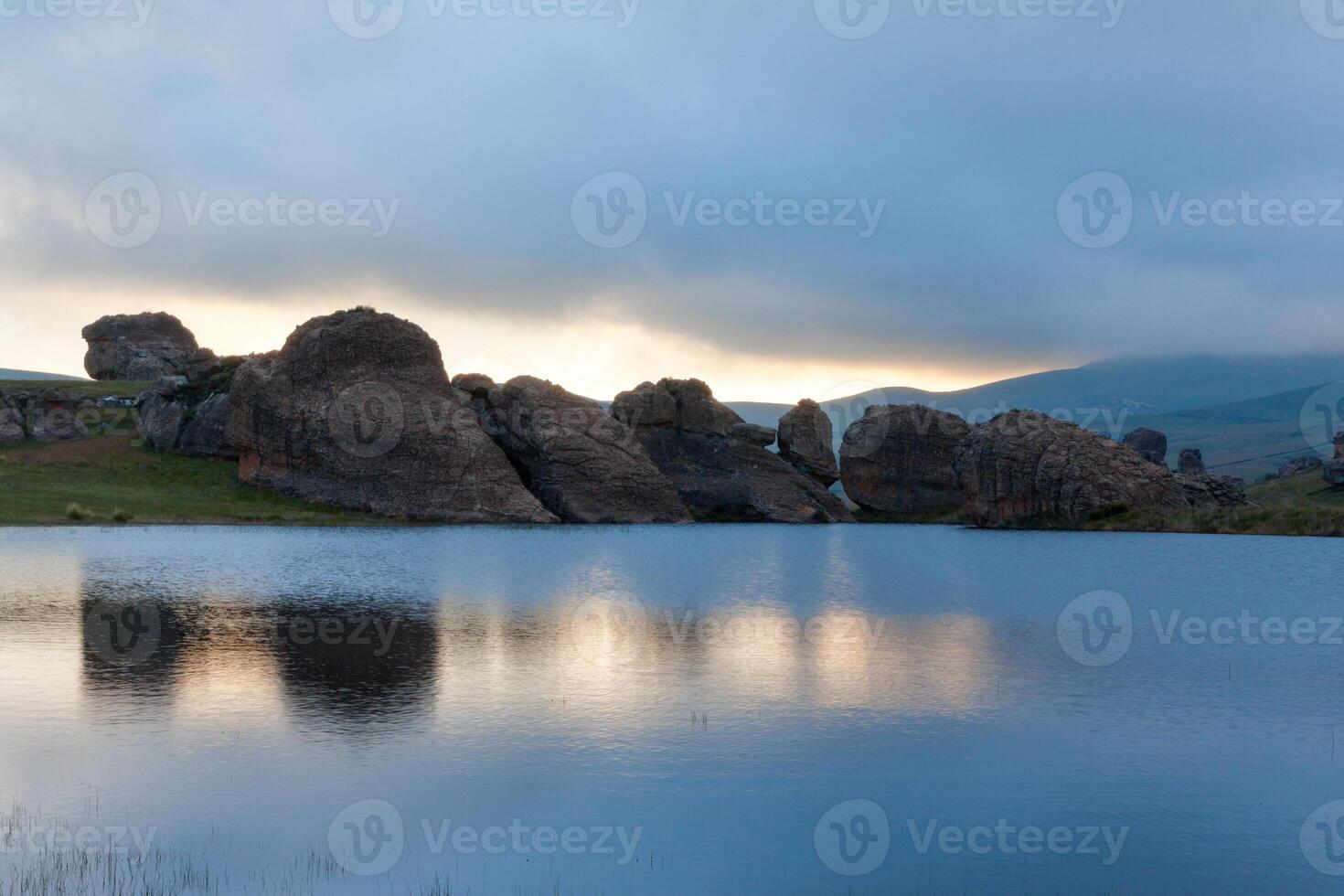 Rock Reflections on the water photo