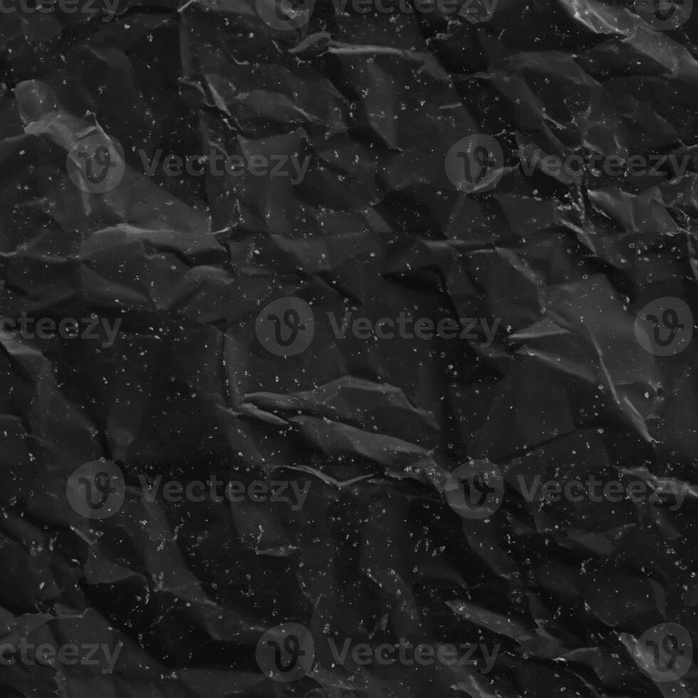 Abstract Background, Textured Surface of Crumpled Black Paper. photo