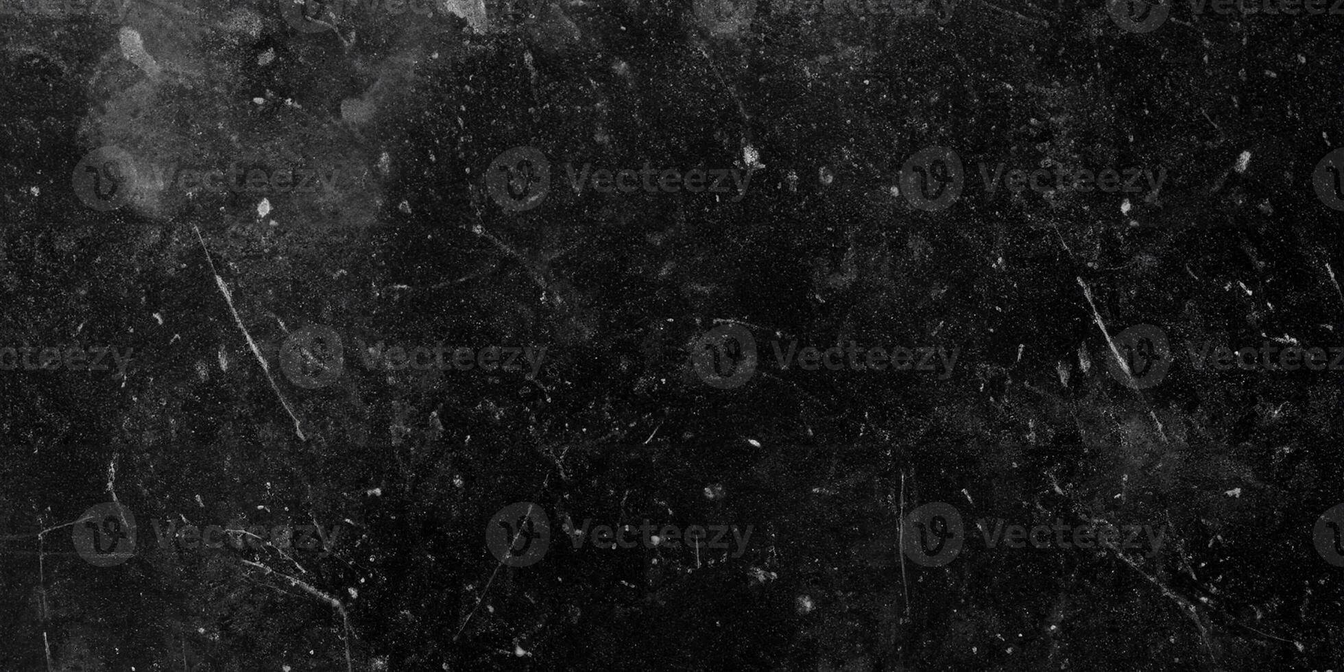 black old grunge wall with scratches texture photo