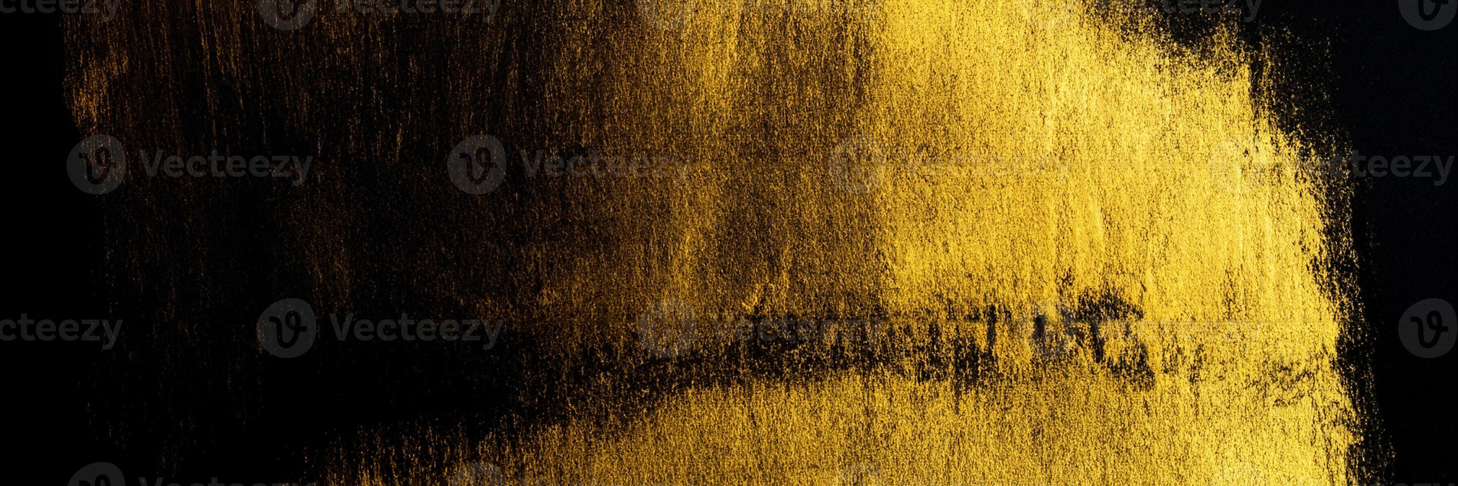 Golden Brushstroke Residue on Stylish Black Background. photo