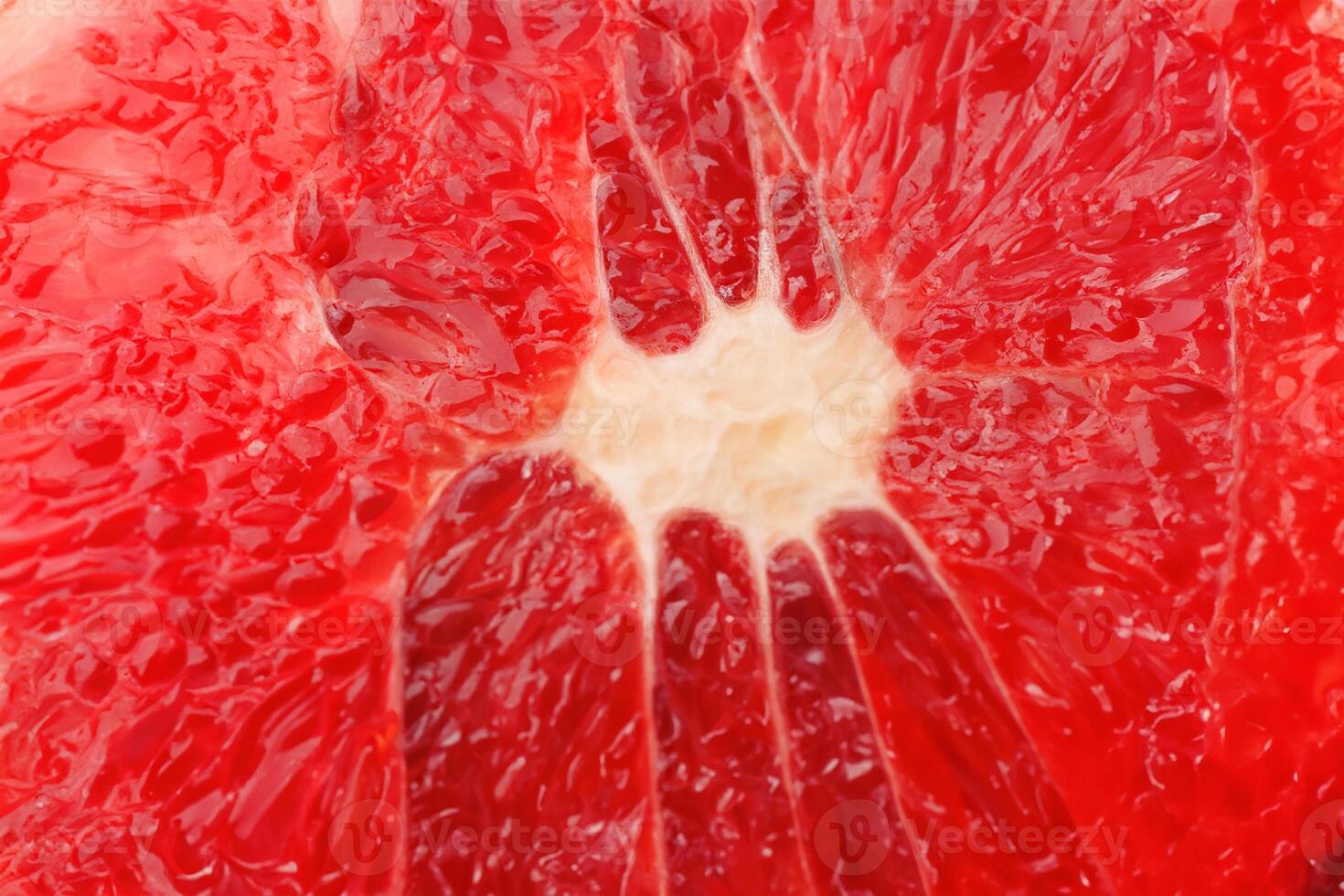 Vibrant Close up of Freshly Sliced Grapefruit. photo