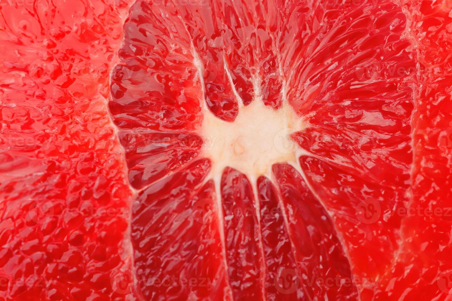 Vibrant Close up of Freshly Sliced Grapefruit. photo