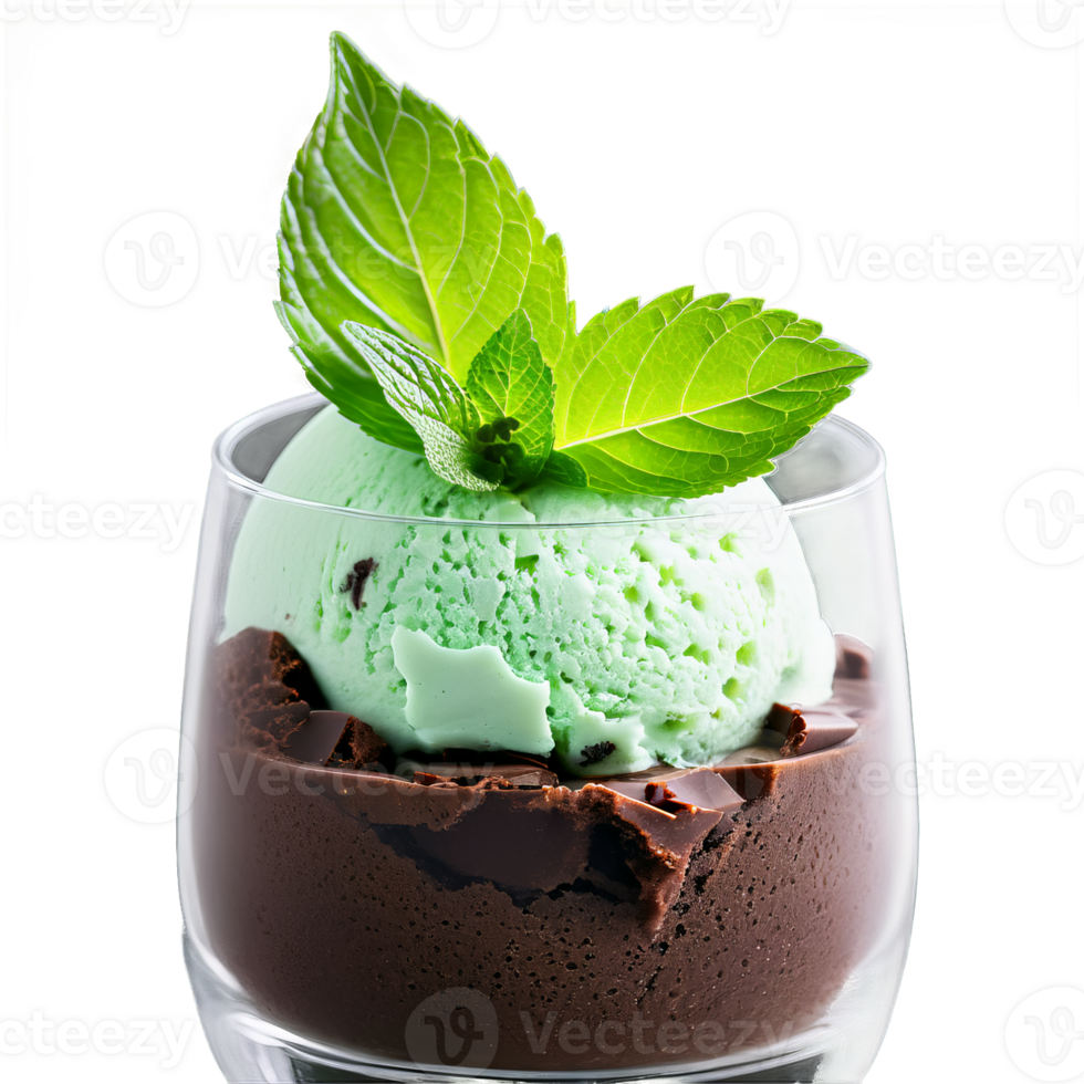 Mint chocolate chip ice cream in a clear glass tumbler with a sprig of