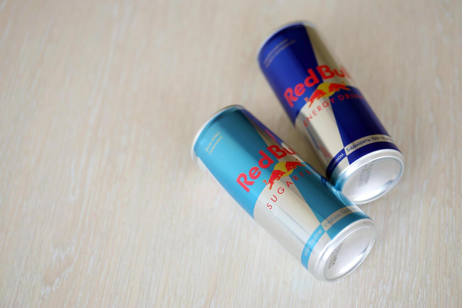 TERNOPIL, UKRAINE - JULY 7, 2023 Red Bull energy drink aluminium tin can with original design photo