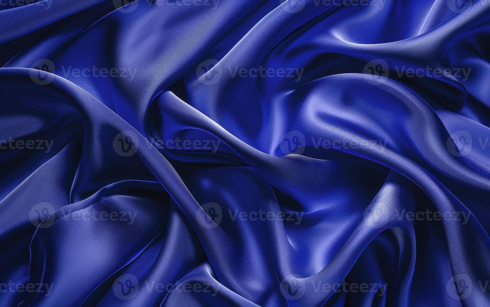 Dramatic navy blue satin with sensuous folds and curves exuding an air of sophistication and elegant allure. photo