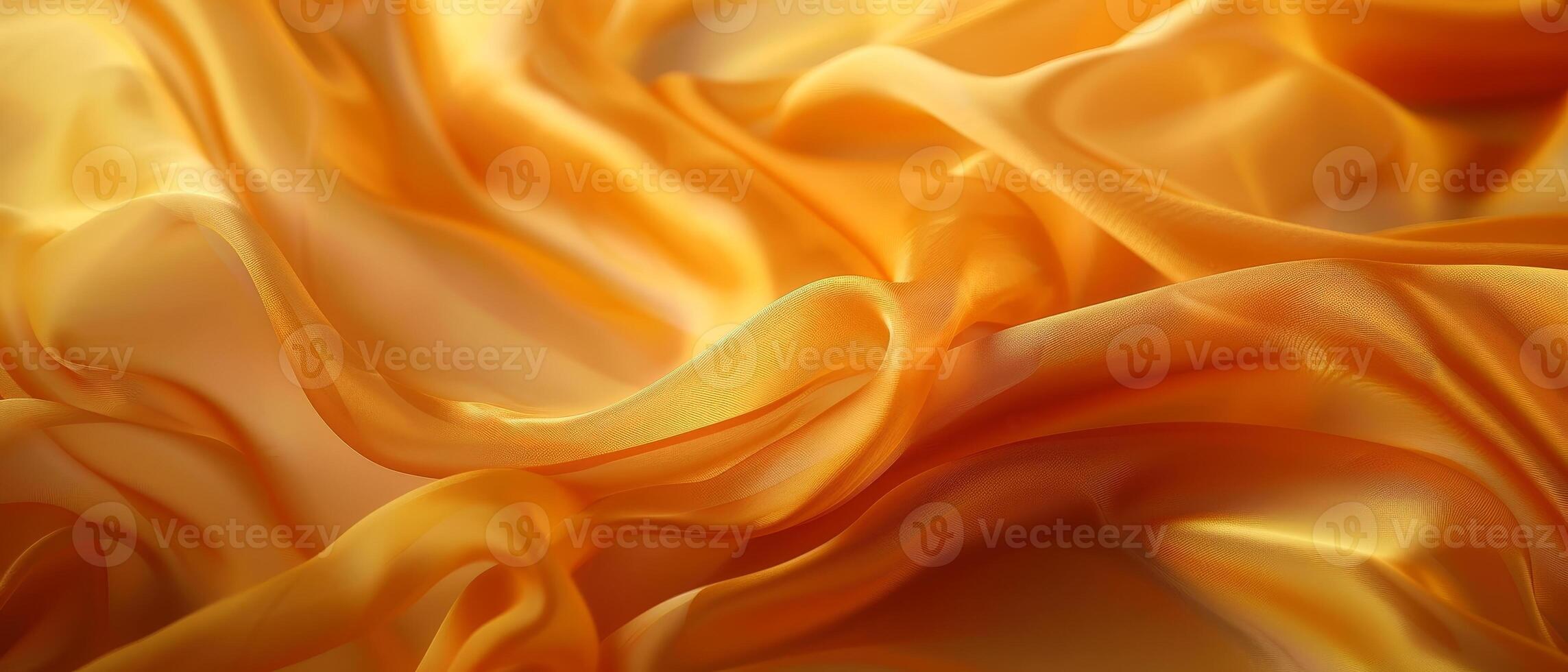 Golden yellow satin draped elegantly in soft undulating waves, exhibiting the radiant sheen and supple texture of the fabric. photo