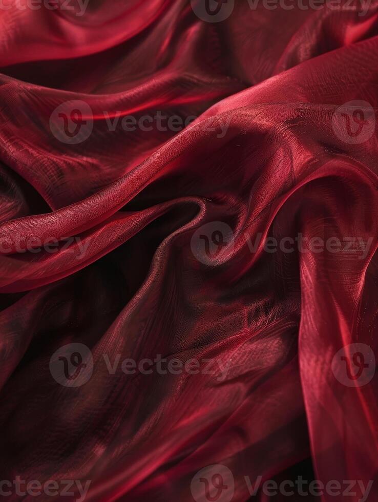 Luxurious deep red satin silk fabric, elegantly draped with soft, smooth textures and rich folds. photo