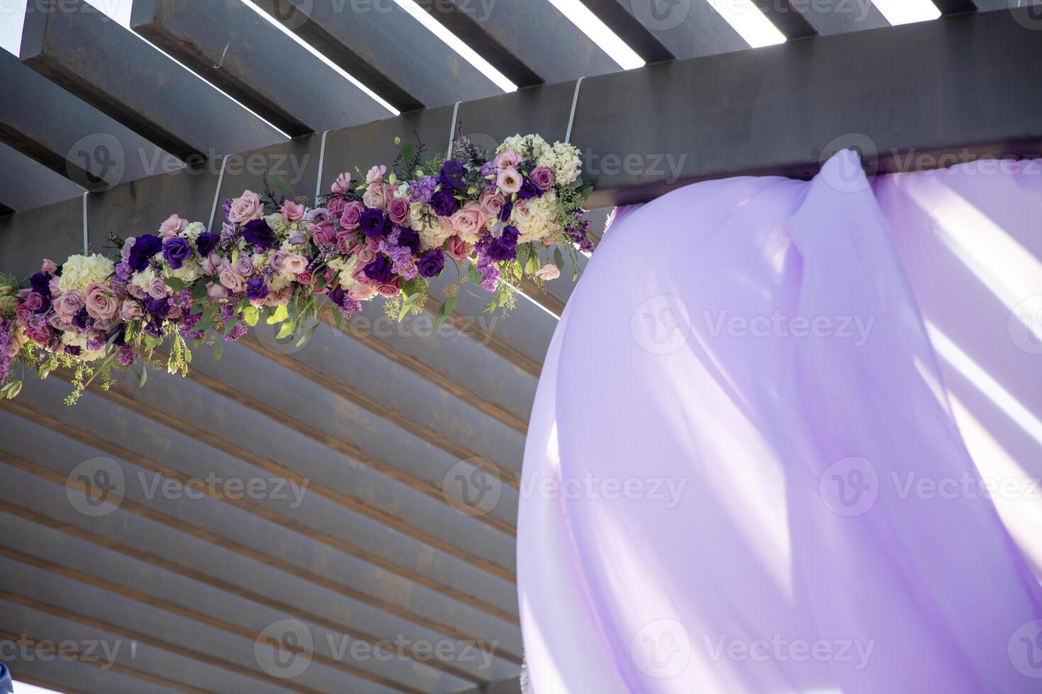 Florals hanging with a drape photo