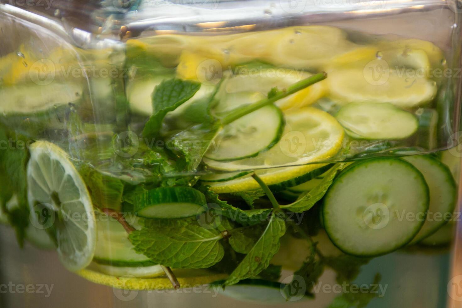 Lemon, cucumber and mint water photo