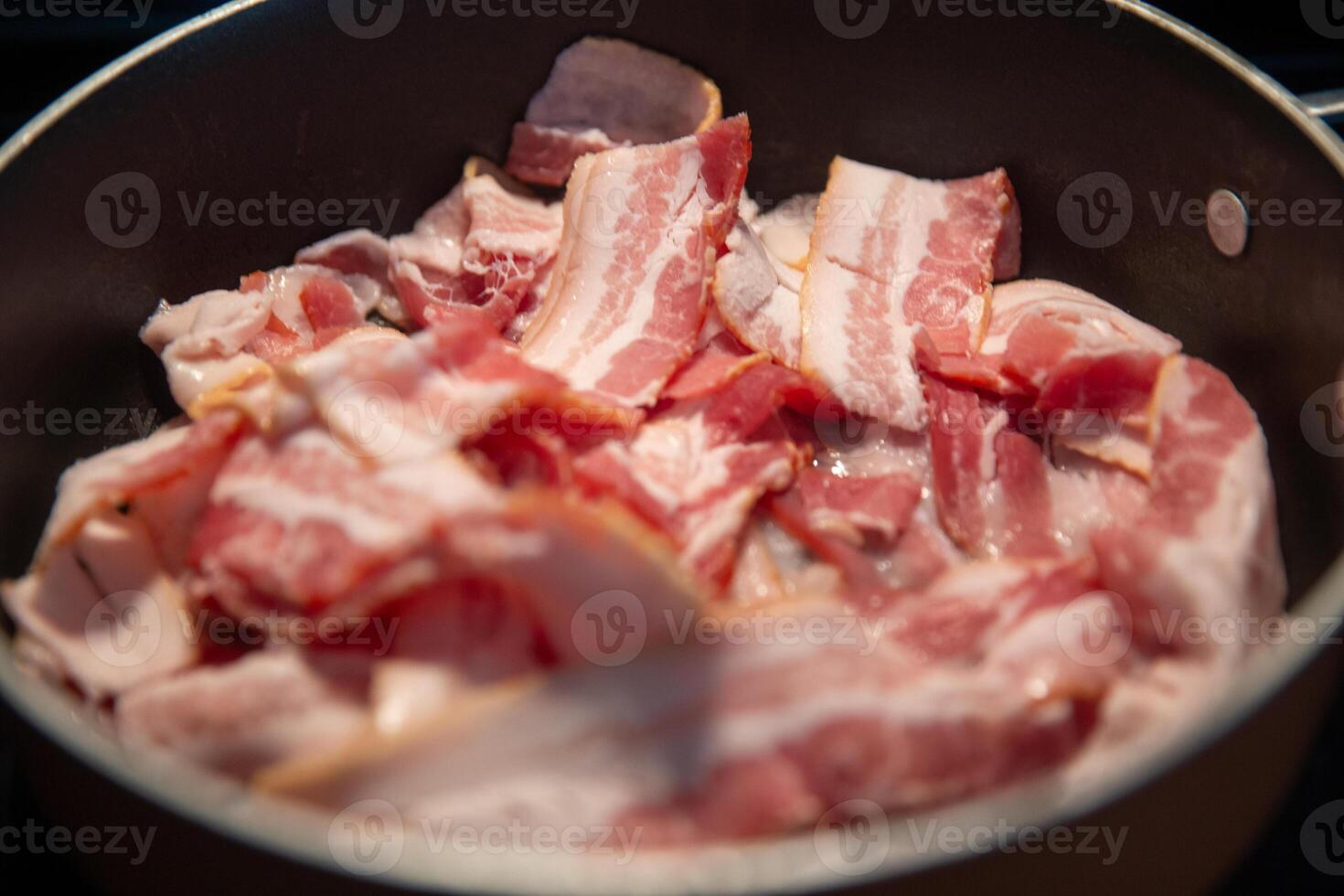 Frying Raw Bacon photo