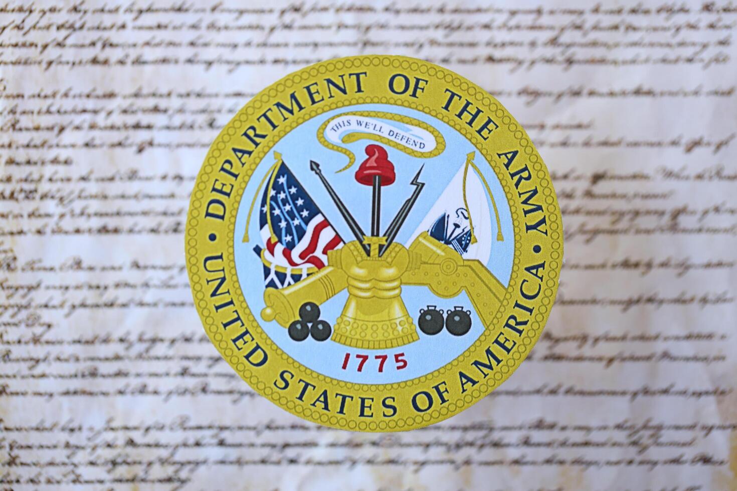 KYIV, UKRAINE - MARCH 9, 2024 US Department of Army seal on United States Constitution photo