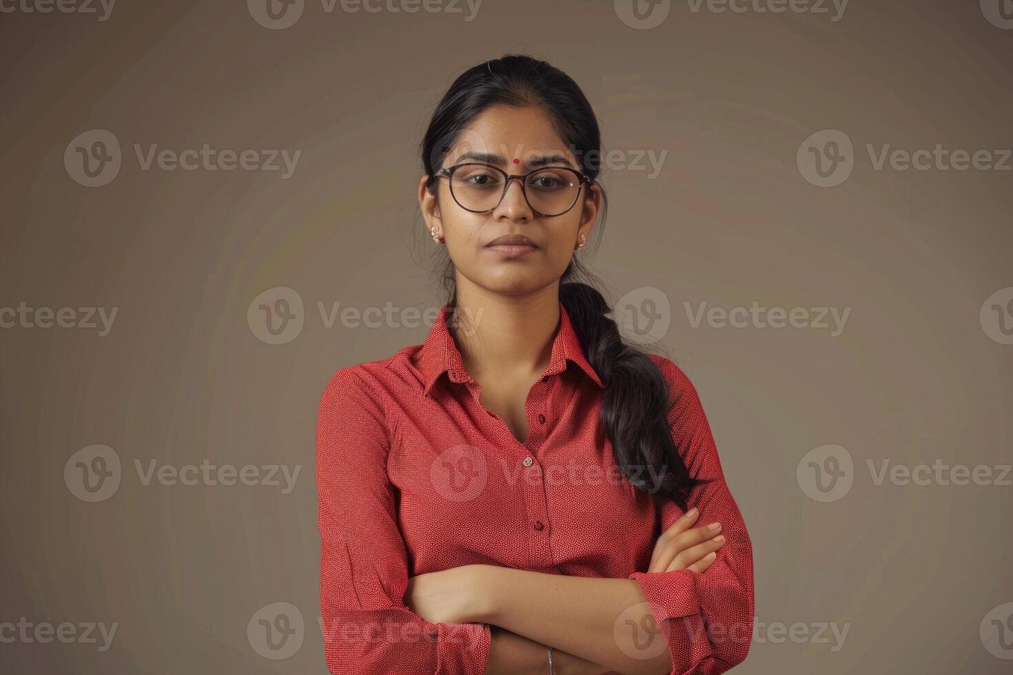 AI generated Confident Indian woman in professional attire posing for portrait. photo