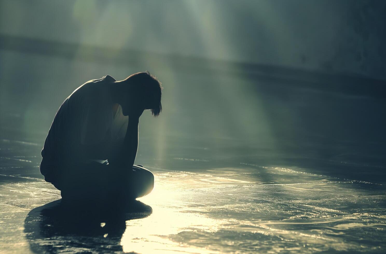 Man praying in solitude photo