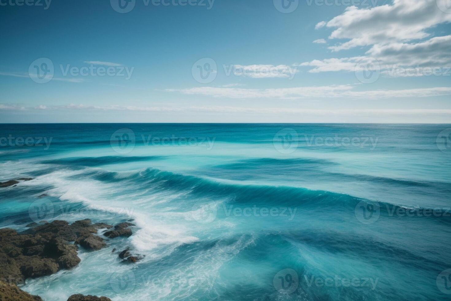 a beautiful sunset over the ocean with waves photo