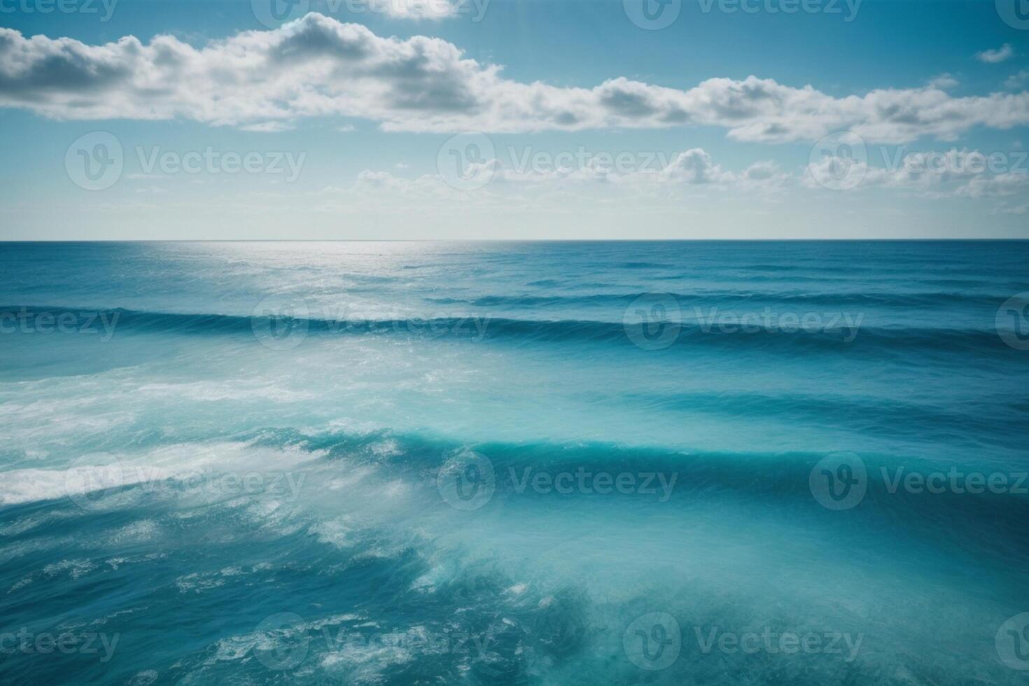 azul Oceano con montañas y nubes foto